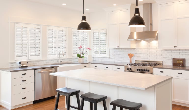 Plantation shutters in a bright Phoenix kitchen.